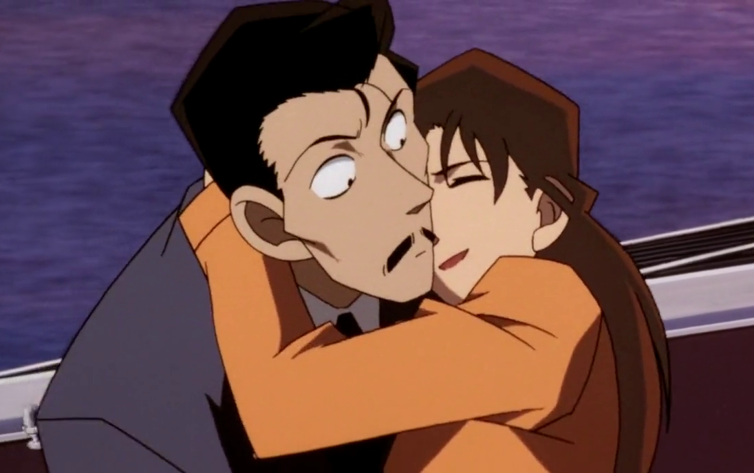 As Kogoro carries the barely-conscious Ran, she hugs him around the neck like how she did as a little kid